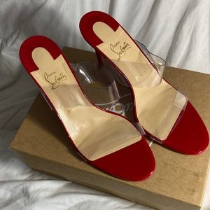 CHRISTIAN LOUBOUTIN just nothing sandals in red.